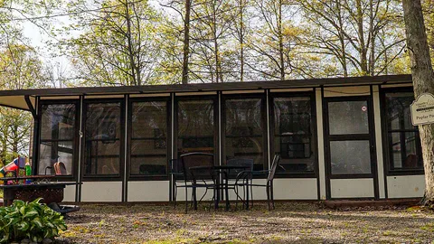 Poplar Point: Sleeps 6 Camper Retreat — Bright Florida Room & Steps to the Fun — image 1 of 7
