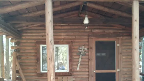 4 Person Rustic Cabin — image 1 of 5