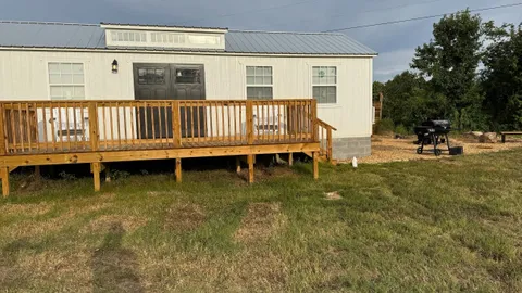 Deluxe Cabin Sleeps 4 — image 1 of 4