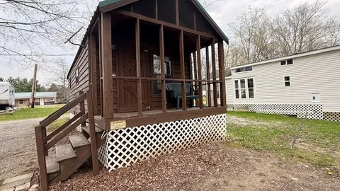 Bass Point - (Sleeps 6) Lakefront Wood Cabin with Screened Porch Overlooking the Water — image 1 of 8