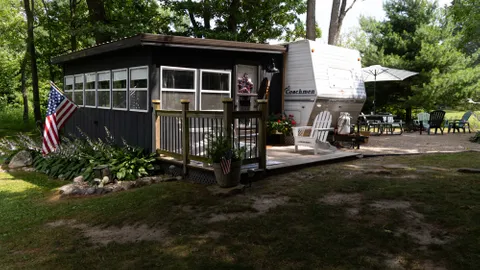 "THE OLIVE BRANCH" - {Large Camper Rental with Attached Porch} — image 1 of 22