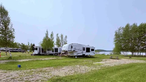 Back-In Full-Service Deluxe Water View Site (3 way) 50/30amp & Water & Sewer — image 1 of 2