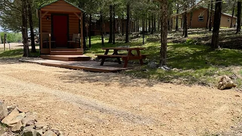 Back-In RV site 5 with Optional Cabin Add-on — image 1 of 2