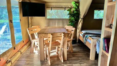 Premium Riverfront Glamping Tent (Lodge) — image 2 of 7