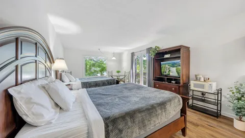 Double Queen w/ Kitchenette and Patio (NO PETS) — image 1 of 6