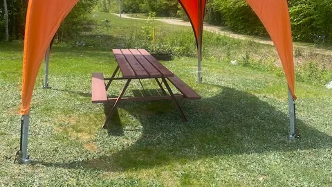 Open Grass Tent Site with Canvas Awning — image 3 of 3