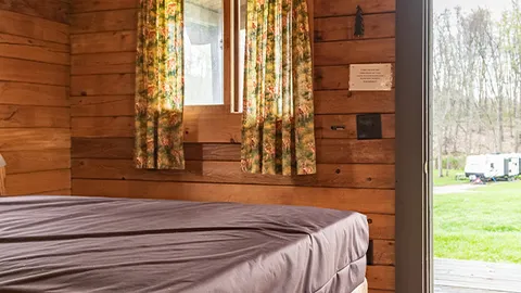 4 Person Rustic Cabin — image 2 of 5