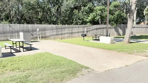Compact Full Hookup Back-In RV Site — image 1 of 1
