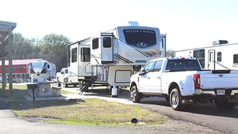 Pull-Thru Premium Economy with Picnic Table, Fire Ring, Grill RV Site — image 4 of 4