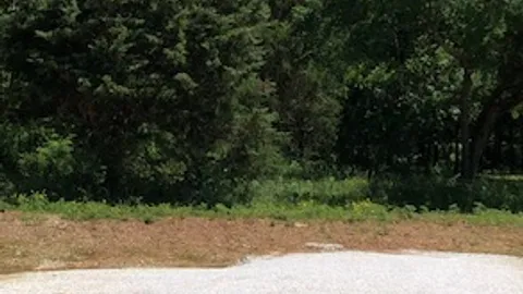 Water + Electric Back-In RV Site — image 1 of 1