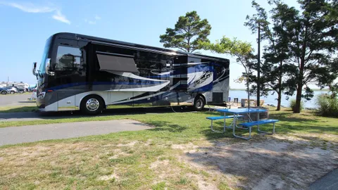 Beachside Waterfront Deluxe Back-In — image 1 of 4