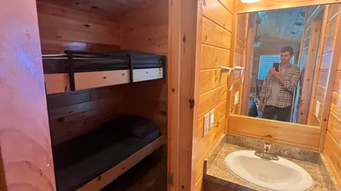 Deluxe Creekside Cabin — image 2 of 17