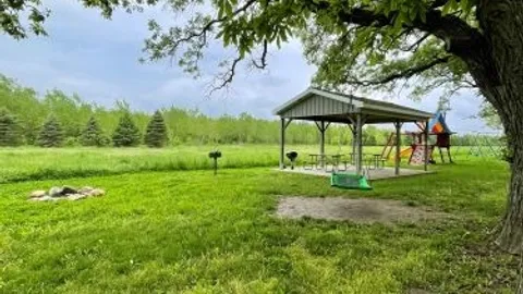 Deluxe Full Hookup Pull-Thru RV Site with Concrete Pad — image 26 of 26