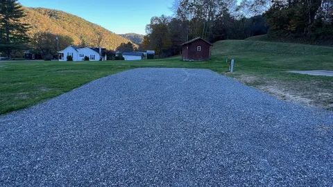 Deluxe Full Hookup Back-In RV Site — image 1 of 3