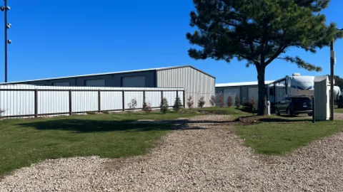 DELUXE FULL HOOK-UP BACK-IN SHADED RV SITE — image 1 of 2