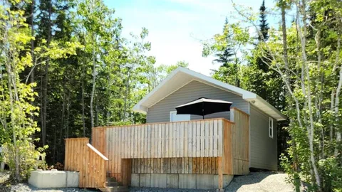 10. Deluxe cabin - Double/Bunk/Patio - Sleeps 3 — image 1 of 7