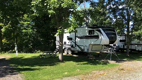 Full-Service - 30-Amp, Water & Sewer Back-In RV Site — image 1 of 1