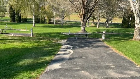 Deluxe-RV w/Tent Pad Site — image 1 of 24