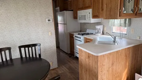 Poolside Cabin: Sleeps 6 Family Cabin — Covered Deck & Flexible Sleeping for Everyone — image 7 of 7