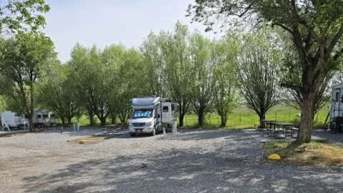 Deluxe Full Hookup RV Site/Water + Electric Tent Site — image 2 of 4
