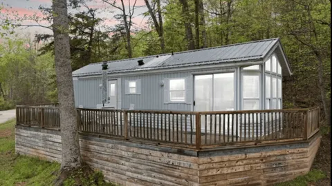 PREMIUM PASTURE VIEW CABIN WITH HOT-TUB — image 1 of 11
