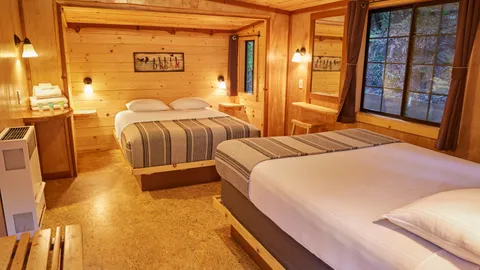 Cabin with Two Queen Beds — image 2 of 8