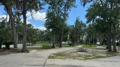 Club Deluxe - 30/50 AMP - Concrete Pull Through RV Site — image 1 of 2