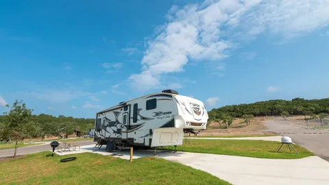 Red Carpet Pull-Thru RV (Unlevel) — image 1 of 1