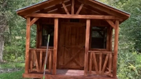 Rustic Cabin with Porch — image 2 of 4