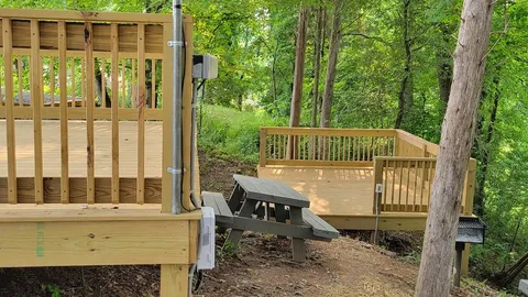 Hillside Premium Tent Sites - 2 wooden platforms — image 1 of 3