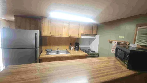 2 BR 4 Person River Front Cabin — image 1 of 4