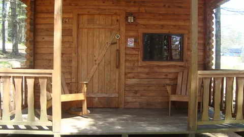 Wooded Cabins — image 1 of 2