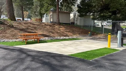 Deluxe Back-In RV Site — image 1 of 5