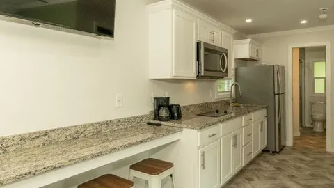 Deluxe 2 Bedroom Cottage — image 2 of 14