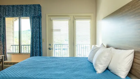1 King Bed - Balcony - Waterview (Adjoining) — image 1 of 5