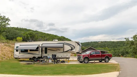 Red Carpet Back-In RV (Unlevel) — image 1 of 6
