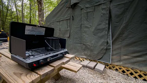 Area B Glamping: Furnished Military Tent - 16' x 16' — image 2 of 14