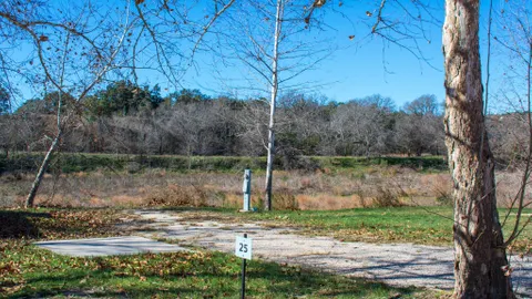 Premium Creekside Full Hookup Back-In RV — image 1 of 6
