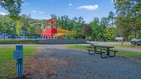 Pull-Through Deluxe RV Site — image 1 of 2