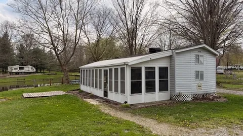 Lakefront Cabin — Sleeps 6 Huge Florida Room & Expansive Yard on the Water Cabin: — image 1 of 6