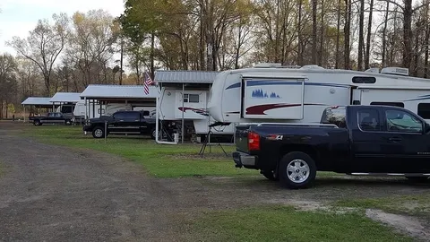 Inclusive Full Hookup RV Site (Back-in) — image 1 of 1