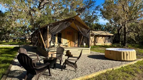 Premium Riverfront Glamping Tent (Lodge) — image 2 of 7
