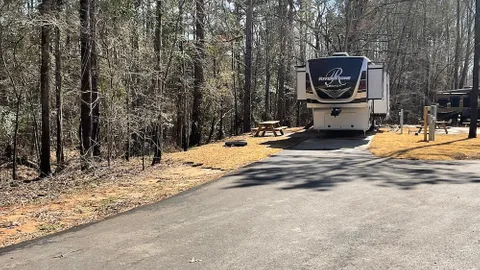 80' Wooded Back In/FHU 30/50amp - Long Term — image 1 of 2